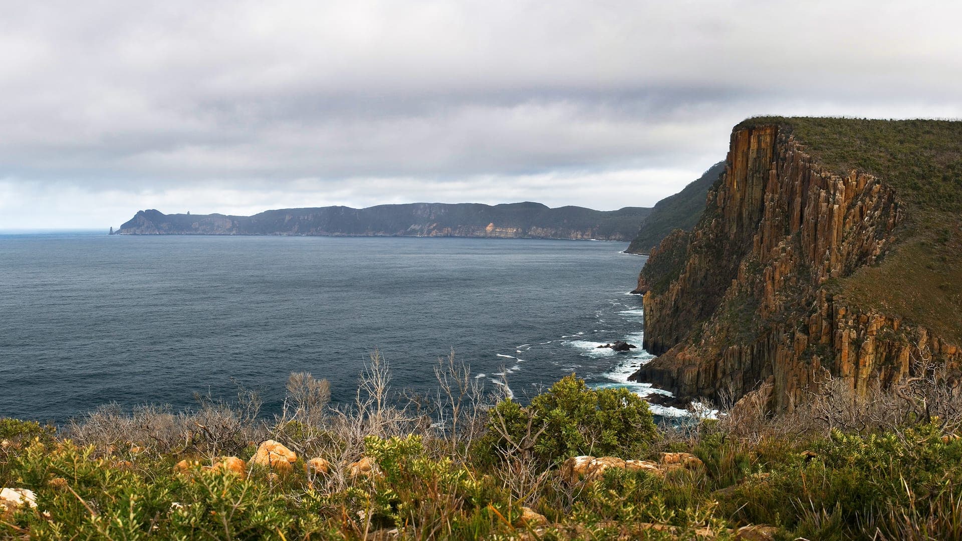 Dolerite sea cliffs at Cape Pillar falling into the Tasman Sea